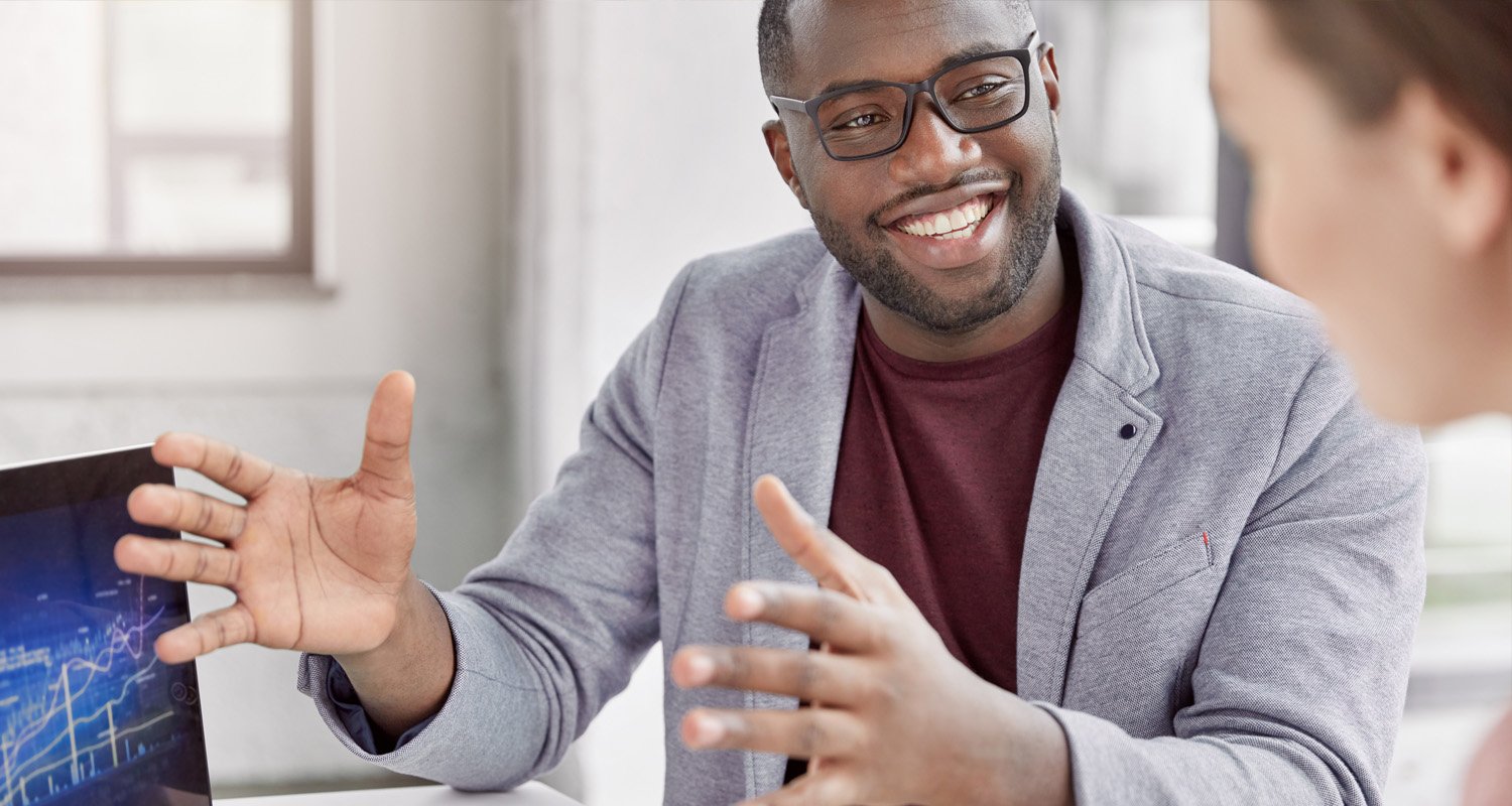 Educator holding a training session in an office setting.